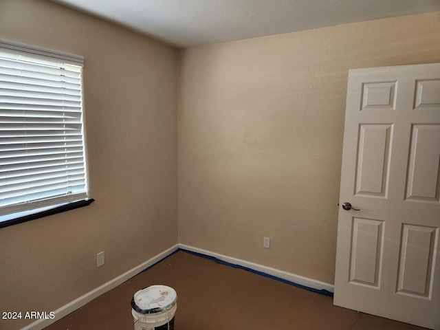 empty room with baseboards