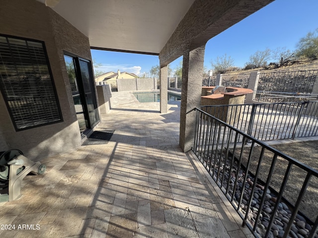 15230 N Blackbird Dr, Fountain Hills, AZ 85268 - wooden deck with a patio and a fenced backyard