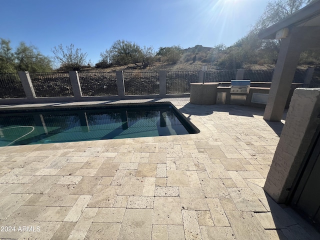 15230 N Blackbird Dr, Fountain Hills, AZ 85268 - view of pool featuring a patio and exterior kitchen