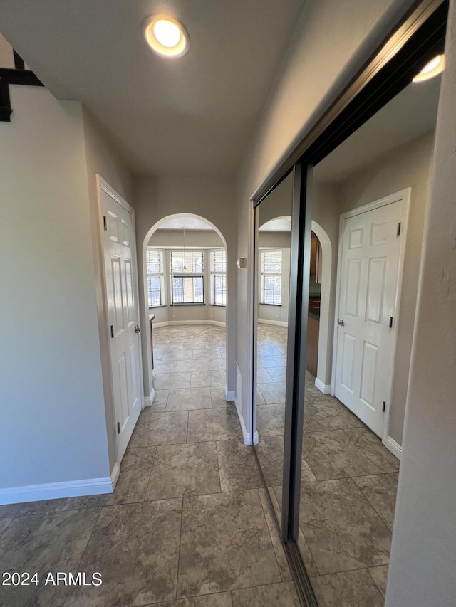 15230 N Blackbird Dr, Fountain Hills, AZ 85268 - hall featuring arched walkways and baseboards