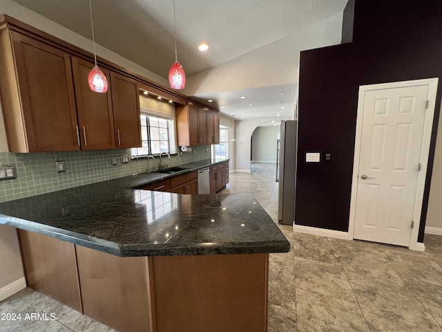 15230 N Blackbird Dr, Fountain Hills, AZ 85268 - kitchen with arched walkways, a sink, appliances with stainless steel finishes, baseboards, and vaulted ceiling