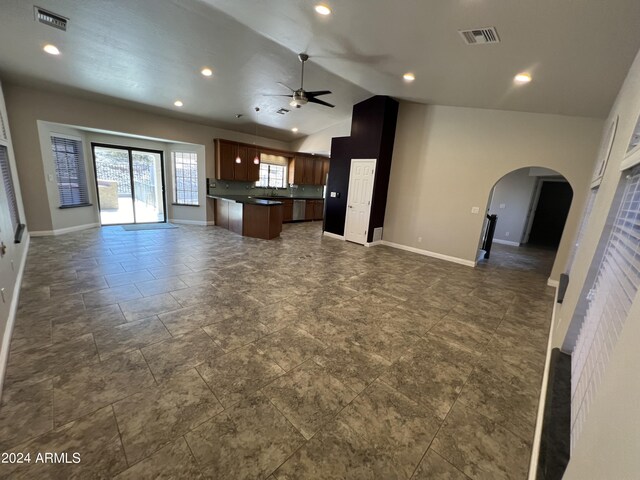 15230 N Blackbird Dr, Fountain Hills, AZ 85268 - unfurnished living room featuring arched walkways, ceiling fan, baseboards, recessed lighting, and lofted ceiling