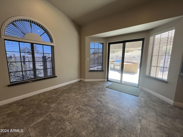 15230 N Blackbird Dr, Fountain Hills, AZ 85268 - empty room with baseboards and lofted ceiling