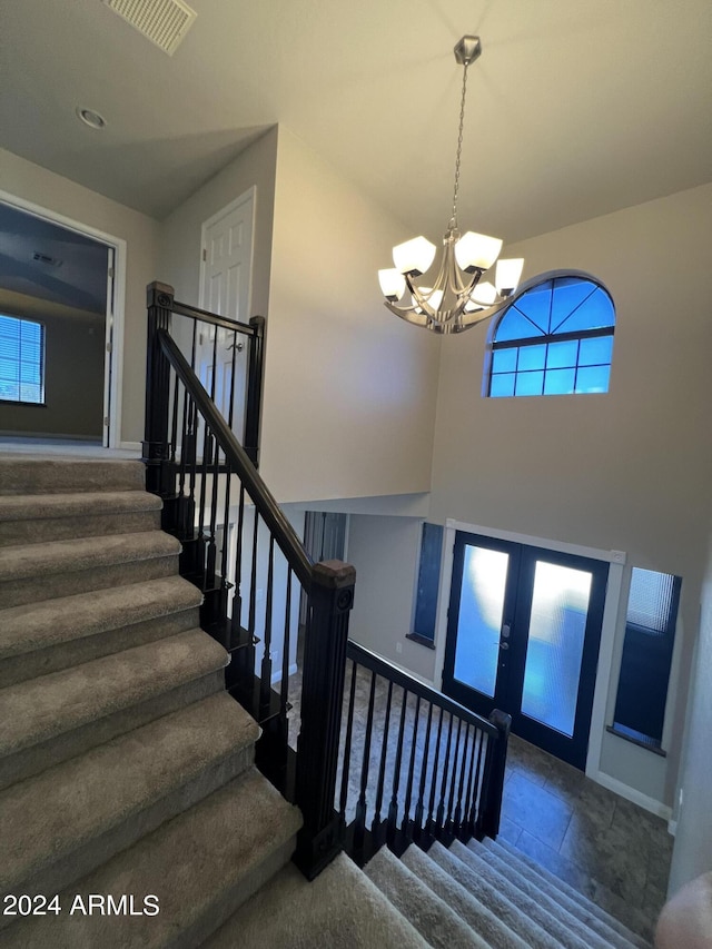 15230 N Blackbird Dr, Fountain Hills, AZ 85268 - stairs with a chandelier, baseboards, french doors, and tile patterned floors