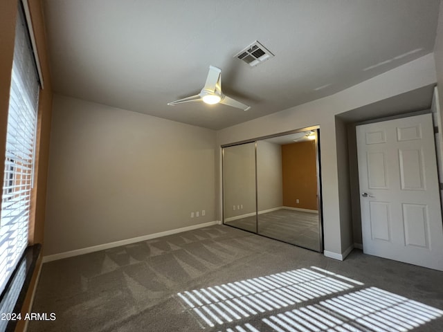 15230 N Blackbird Dr, Fountain Hills, AZ 85268 - unfurnished bedroom with multiple windows, carpet, a closet, and baseboards