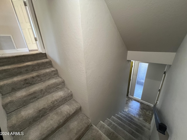 15230 N Blackbird Dr, Fountain Hills, AZ 85268 - stairs with a textured wall and baseboards