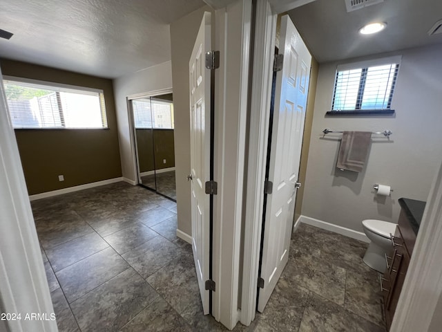 15230 N Blackbird Dr, Fountain Hills, AZ 85268 - bathroom featuring toilet, baseboards, and healthy amount of natural light