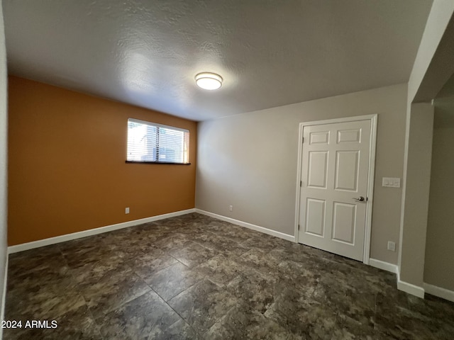 15230 N Blackbird Dr, Fountain Hills, AZ 85268 - unfurnished room featuring baseboards and a textured ceiling