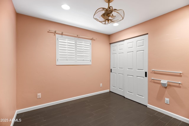 8007 E Del Tesoro Dr, Scottsdale, AZ 85258 - unfurnished bedroom featuring a closet, dark wood finished floors, and recessed lighting