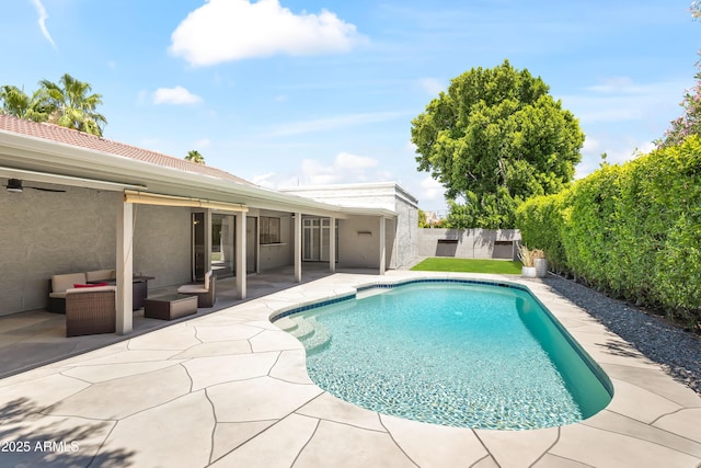 8007 E Del Tesoro Dr, Scottsdale, AZ 85258 - view of swimming pool with a patio area, a fenced backyard, and an outdoor hangout area