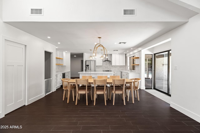 8007 E Del Tesoro Dr, Scottsdale, AZ 85258 - dining space with recessed lighting, dark wood-type flooring, and a chandelier