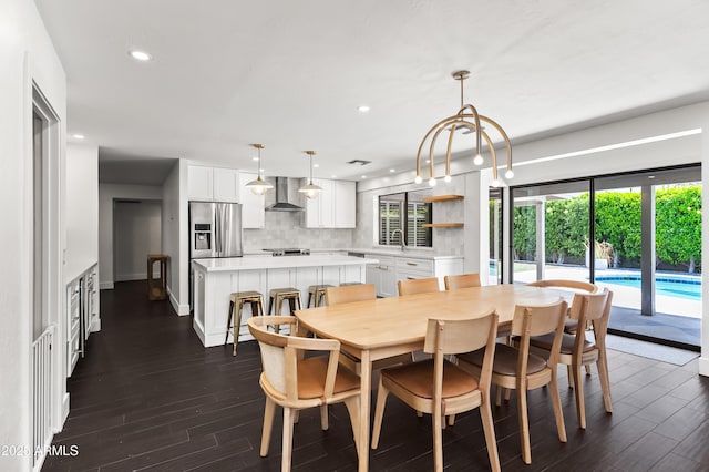 8007 E Del Tesoro Dr, Scottsdale, AZ 85258 - dining space featuring dark wood-style floors and recessed lighting
