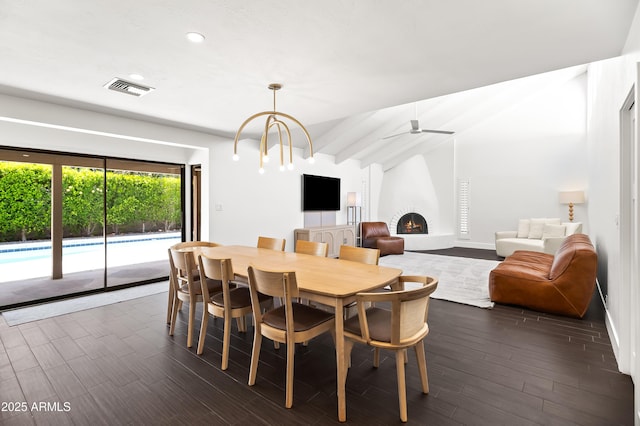 8007 E Del Tesoro Dr, Scottsdale, AZ 85258 - dining area with dark wood-style flooring, recessed lighting, a large fireplace, and ceiling fan