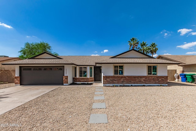 2348 E Diamond Ave, Mesa, AZ 85204 - single story home with brick siding, a garage, driveway, and a shingled roof