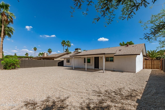 2348 E Diamond Ave, Mesa, AZ 85204 - back of house with a patio, stucco siding, a fenced backyard, and roof with shingles