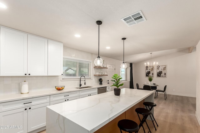 2348 E Diamond Ave, Mesa, AZ 85204 - kitchen featuring a sink, dishwasher, a kitchen breakfast bar, white cabinetry, and recessed lighting