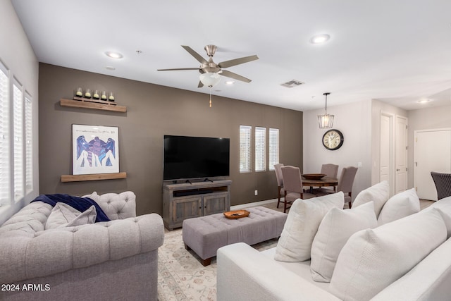 living room featuring ceiling fan