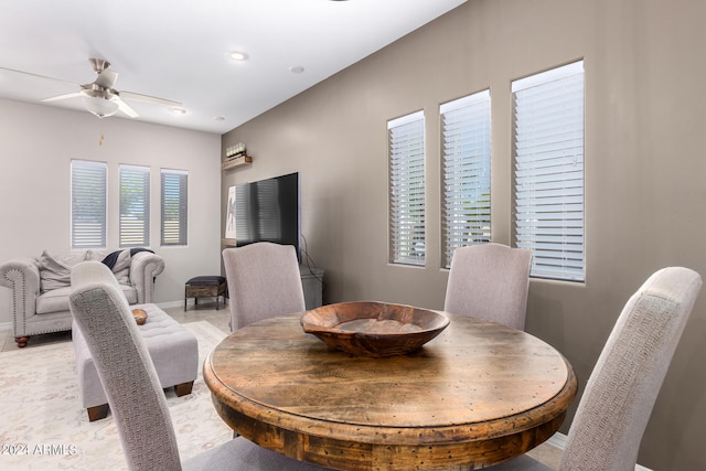 dining room featuring plenty of natural light and ceiling fan