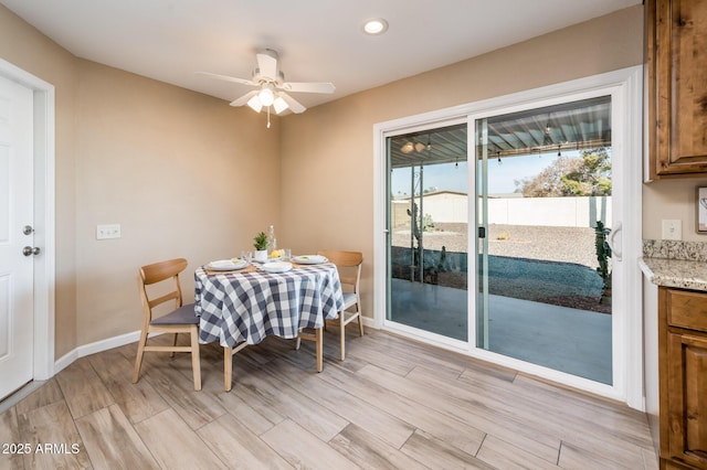 dining room featuring ceiling fan