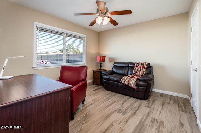 office area featuring ceiling fan and light wood-type flooring