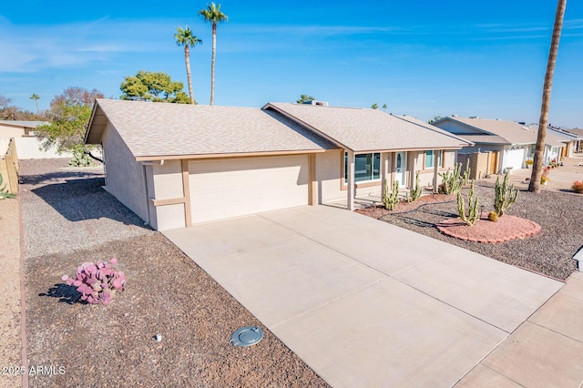 ranch-style house featuring a garage