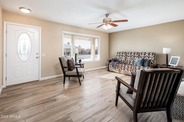 interior space featuring ceiling fan and light hardwood / wood-style flooring