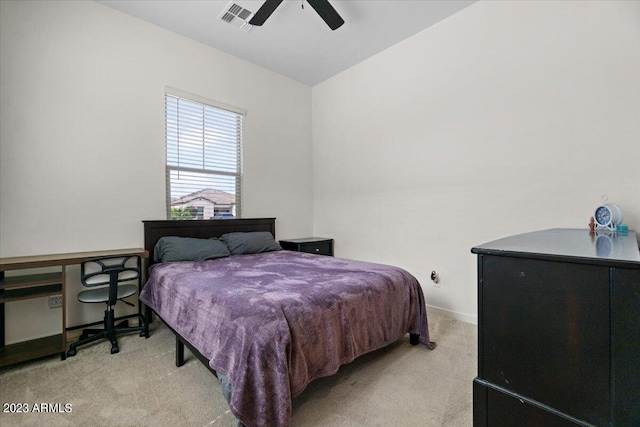 carpeted bedroom with lofted ceiling and ceiling fan