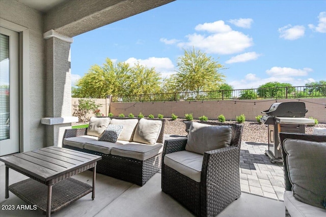 view of patio / terrace with a grill and an outdoor living space