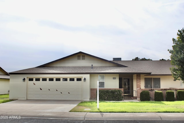 ranch-style house with a garage, brick siding, driveway, roof with shingles, and a front yard