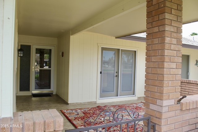 property entrance featuring a chimney