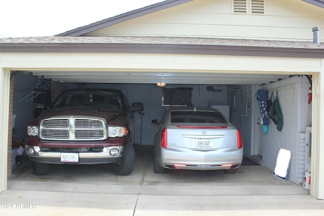 garage with driveway