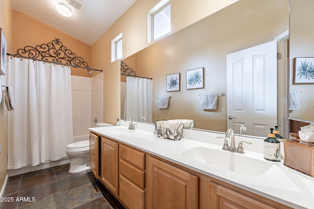 bathroom featuring a sink, toilet, shower / bath combo, and double vanity