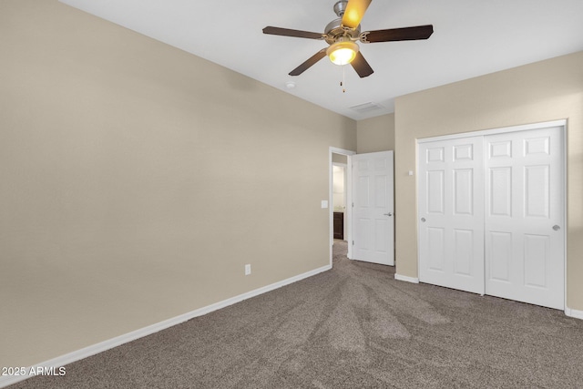 unfurnished bedroom featuring ceiling fan, carpet flooring, visible vents, baseboards, and a closet