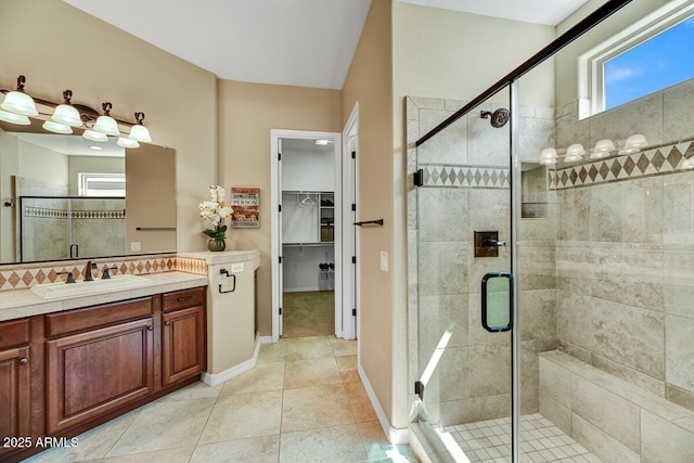 12903 W Brookhart Way, Peoria, AZ 85383 - full bath featuring vanity, healthy amount of natural light, a shower stall, and a walk in closet