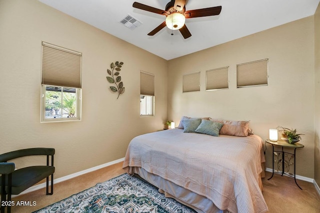 12903 W Brookhart Way, Peoria, AZ 85383 - carpeted bedroom featuring baseboards, multiple windows, and a ceiling fan