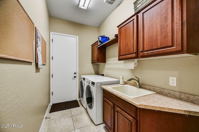 12903 W Brookhart Way, Peoria, AZ 85383 - washroom with cabinet space, washing machine and dryer, light tile patterned floors, and baseboards