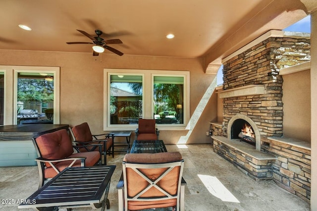 12903 W Brookhart Way, Peoria, AZ 85383 - view of patio featuring a ceiling fan and an outdoor living space with a fireplace