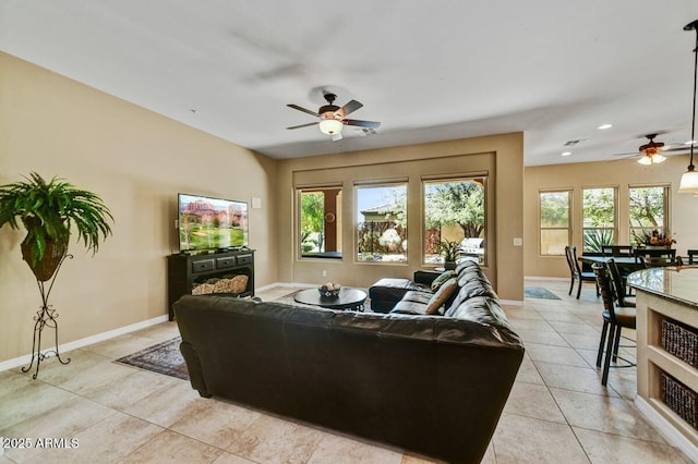 12903 W Brookhart Way, Peoria, AZ 85383 - living room with a ceiling fan, light tile patterned floors, plenty of natural light, and recessed lighting