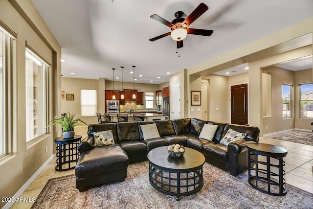 12903 W Brookhart Way, Peoria, AZ 85383 - living area with a ceiling fan, baseboards, and recessed lighting