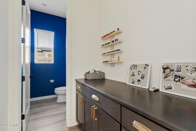 5650 S Feliz, Mesa, AZ 85212 - bathroom with toilet and wood finished floors