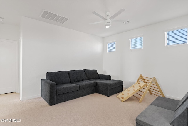 5650 S Feliz, Mesa, AZ 85212 - living room featuring carpet floors, plenty of natural light, and ceiling fan