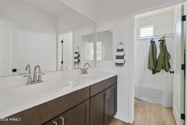 5650 S Feliz, Mesa, AZ 85212 - full bathroom featuring double vanity and wood finished floors
