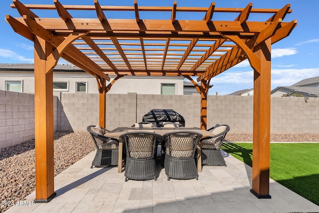 5650 S Feliz, Mesa, AZ 85212 - fenced backyard featuring a pergola, outdoor dining space, and a patio area