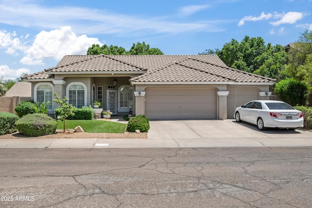 2243 E Cortez Dr, Gilbert, AZ 85234 - mediterranean / spanish-style house with a tile roof, a garage, stucco siding, driveway, and a front yard