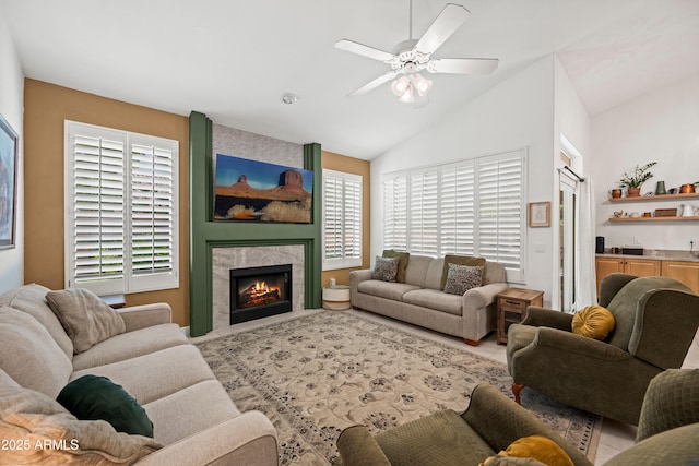 2243 E Cortez Dr, Gilbert, AZ 85234 - living area with lofted ceiling, a ceiling fan, plenty of natural light, and a fireplace