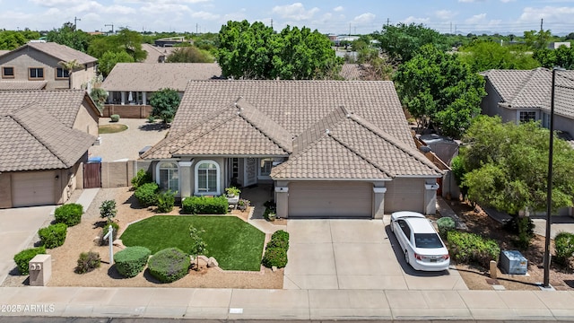 2243 E Cortez Dr, Gilbert, AZ 85234 - view of front of home with a tiled roof, an attached garage, concrete driveway, stucco siding, and a residential view