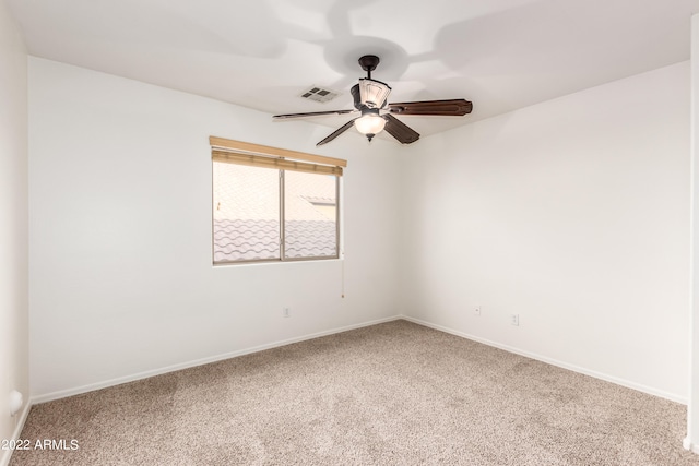 carpeted empty room with ceiling fan