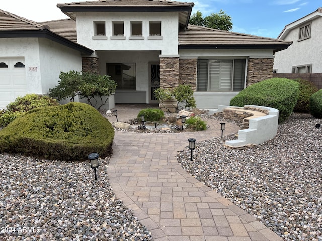 view of front of property featuring a garage