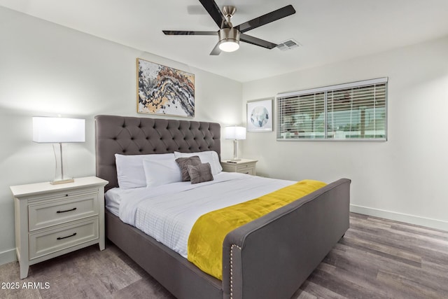 8522 E Virginia Ave, Scottsdale, AZ 85257 - bedroom with wood finished floors, baseboards, and a ceiling fan