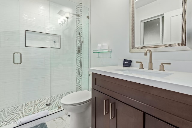 8522 E Virginia Ave, Scottsdale, AZ 85257 - full bathroom with marble look tile flooring, vanity, toilet, and a shower stall